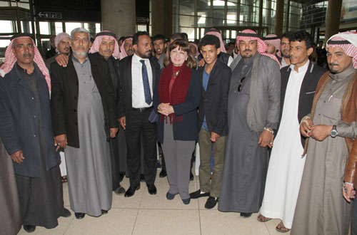 Culture Minister Lana Mamkegh (centre) and several Jordanians receive cast members of 'Theeb', including lead actor Jacir Eid (fourth from right), at the Queen Alia International Airport on Thursday (Petra photo)